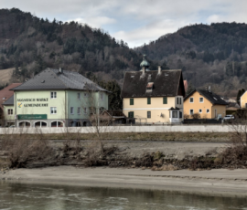 Colorful buildings along the river in Grein, Austria Colorful buildings along the river in Grein, Austria